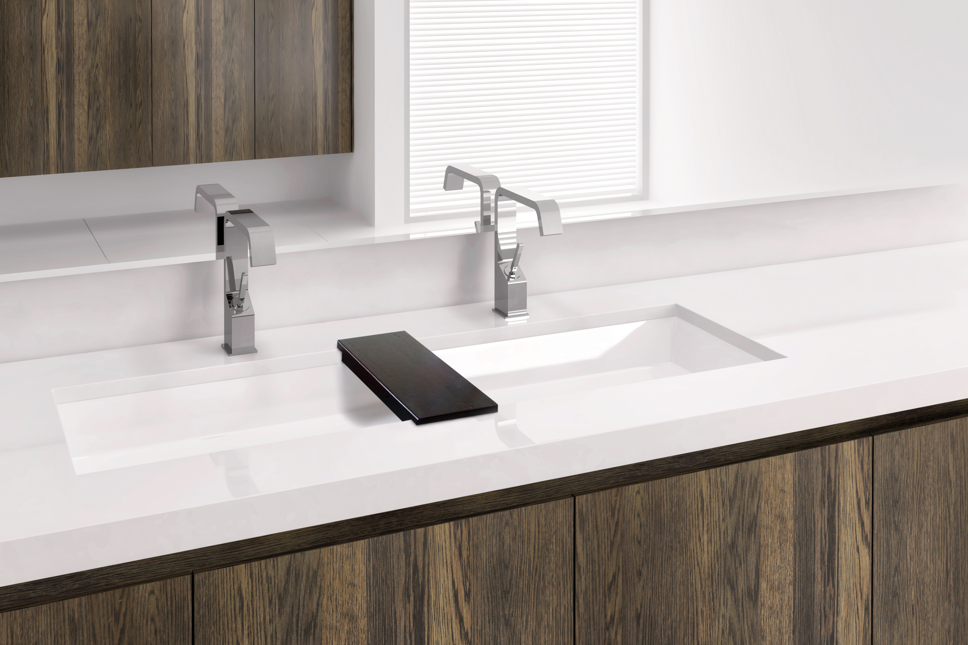 Undermount sinks by Wetstyle. Large rectangular sink with double faucets and wood bridge between them.
